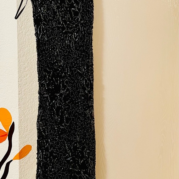 A gorgeous mid length beaded dress by Scala. - Picture 3 of 11